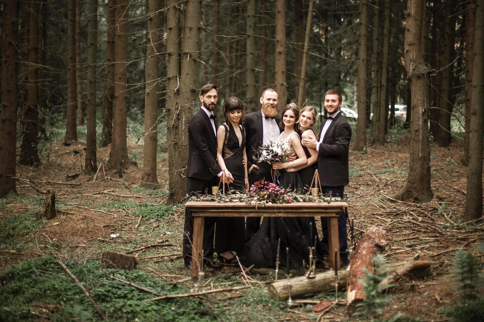 Wedding party photo in woods