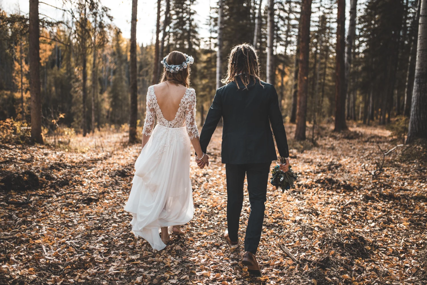 Elegant shot of wedding couple in the woods