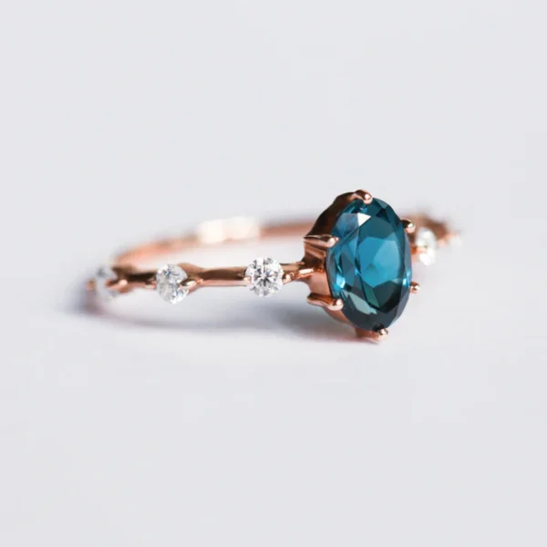 Capucinne Blue Blue Topaz Ring with Moissanite