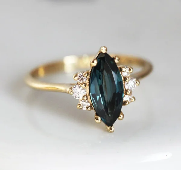 Capucinne Deep Teal Sapphire Diamond Ring