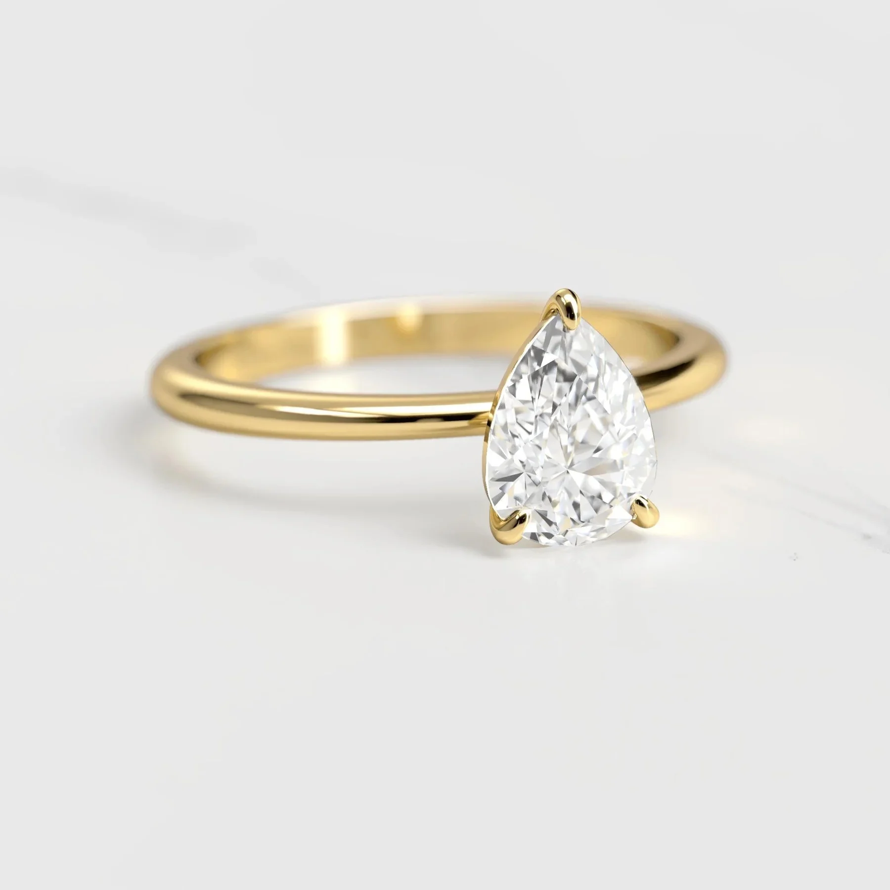 Capucinne Pear Solitaire Moissanite Ring
