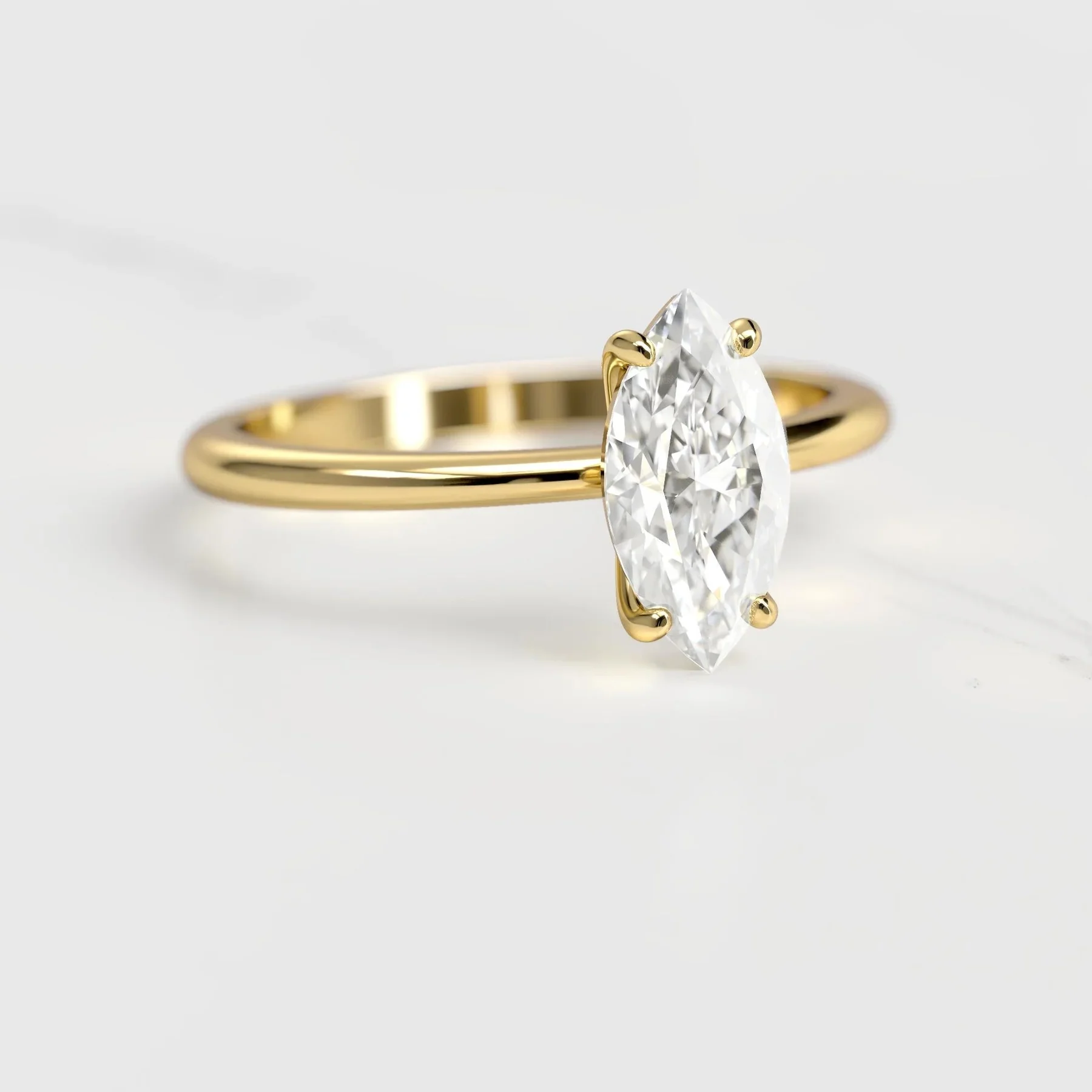 Capucinne Solitaire Marquise Moissanite Ring