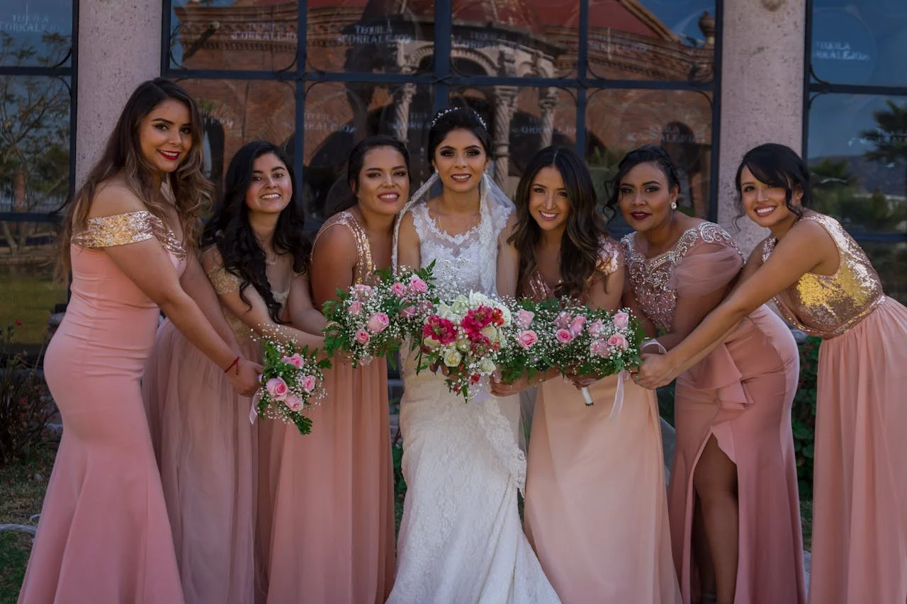 Bride photo alongside her elegant bridesmaids