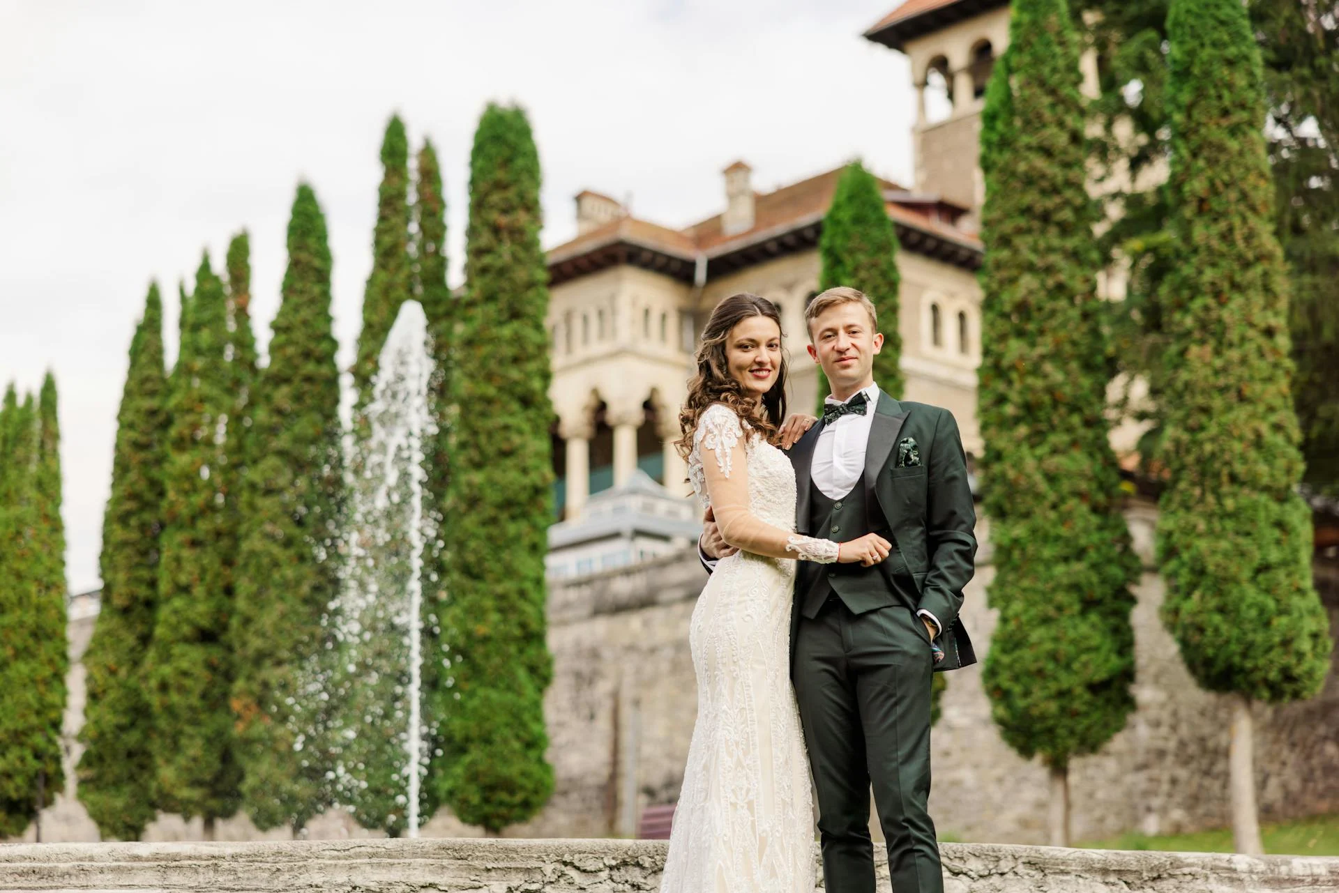 Wedding photo of couple outside castle