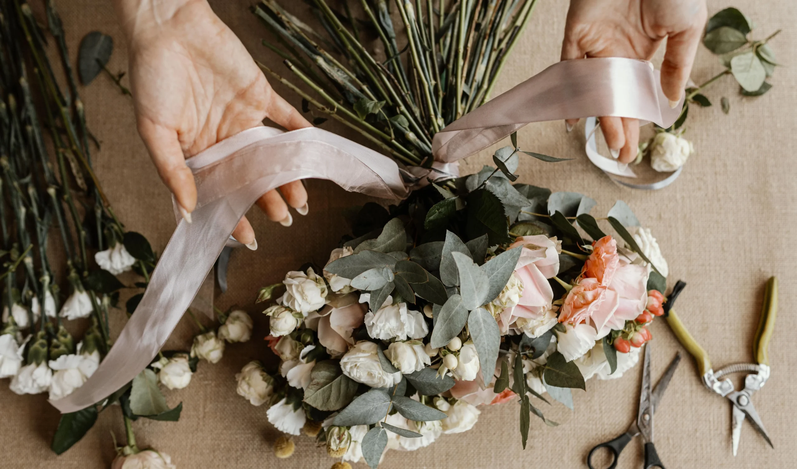 Woman making a beautiful floral bouquet